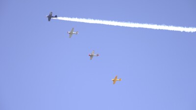T-6 Texans fly over the Warhawk Air Museum