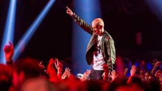 Eminem suprises class in Flint at graduation