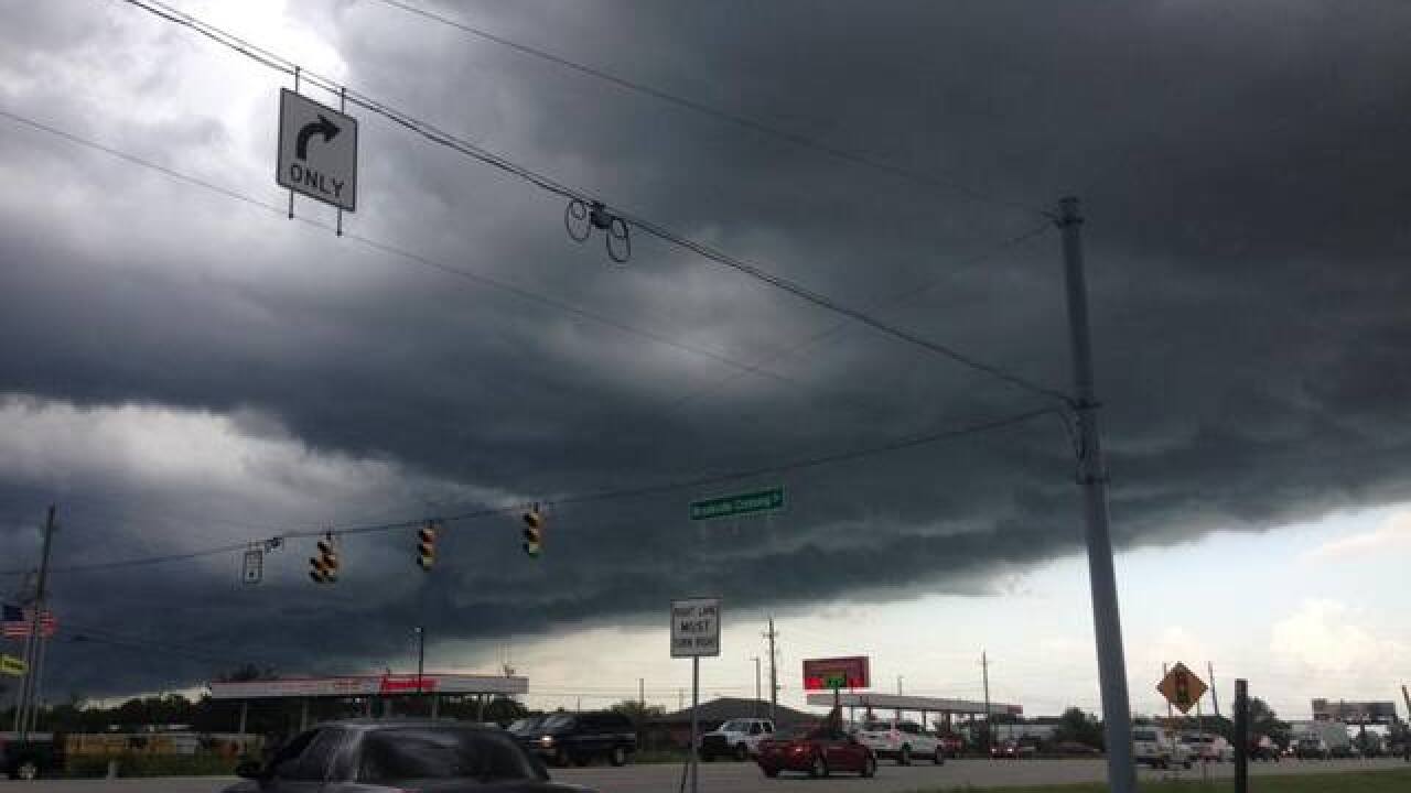 PHOTOS: Ominous skies and storm damage