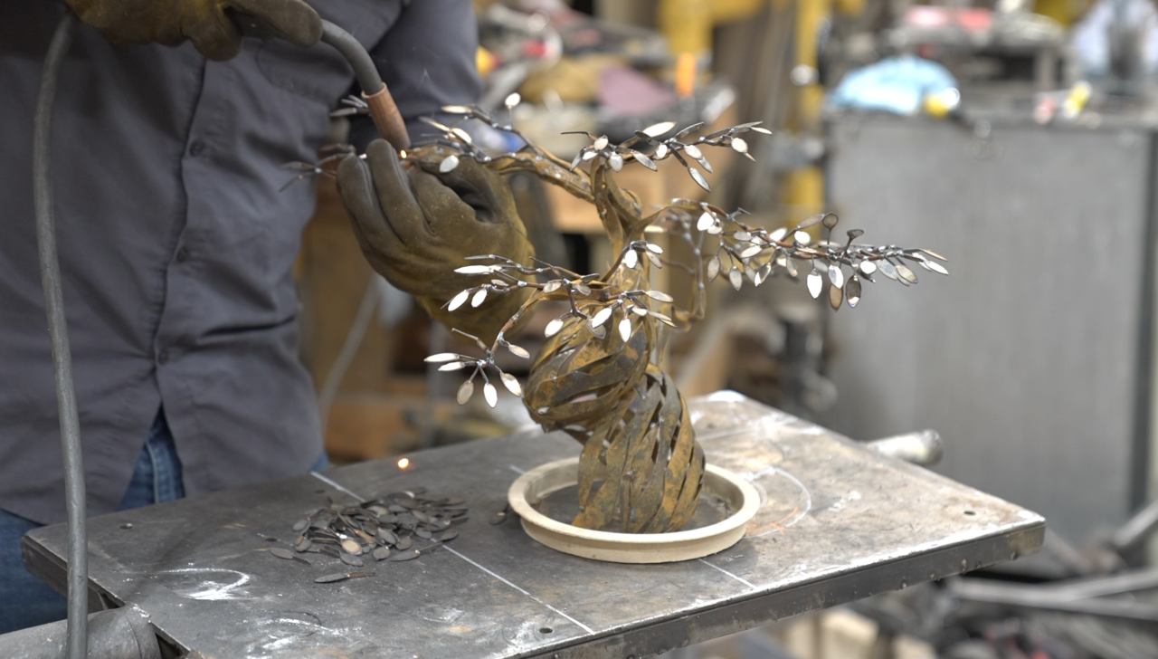 Ivan Iler working in his studio in St. Johns