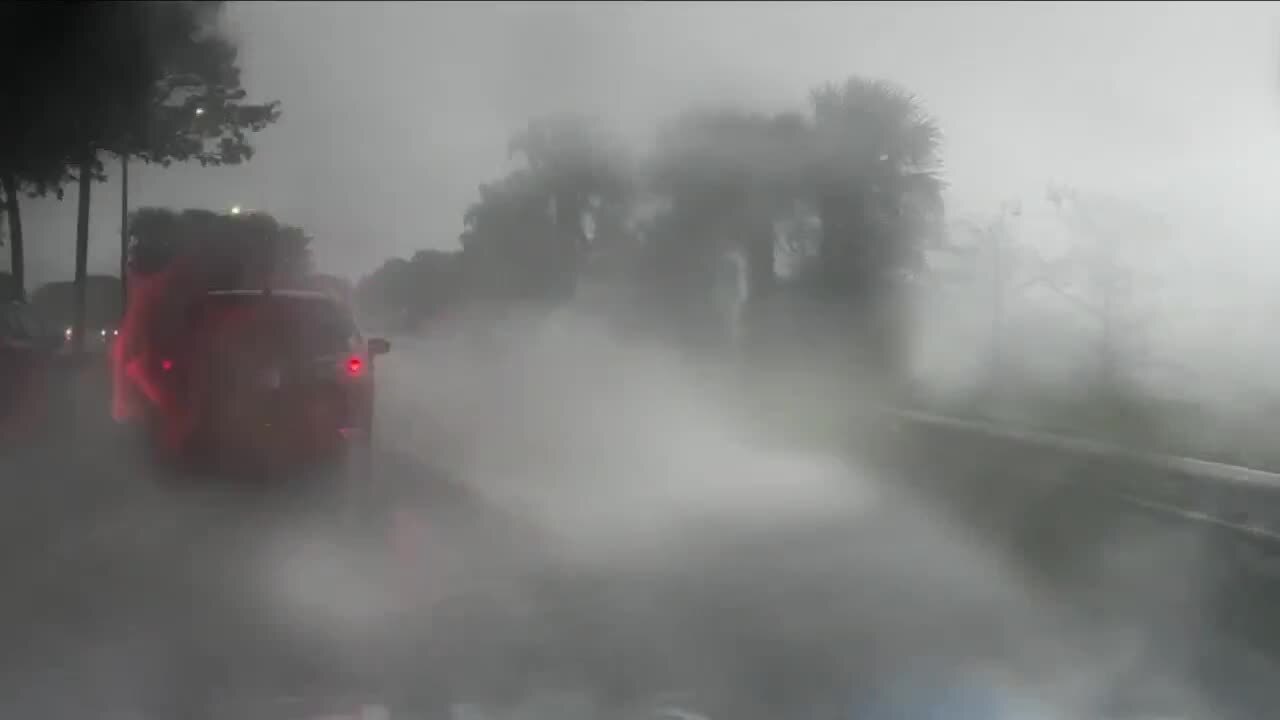 Rear of vehicle driving through heavy rain and wind, Dec. 16, 2023
