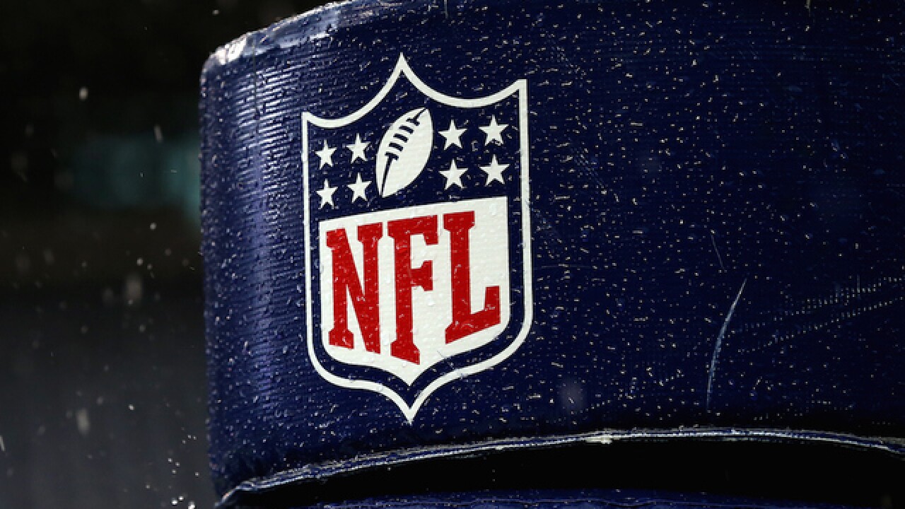 NFL acknowledges link between football, CTE