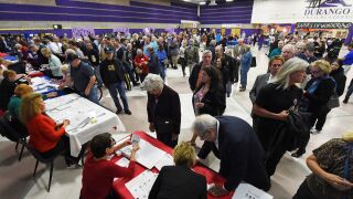 Voters line up for a Republican caucus.