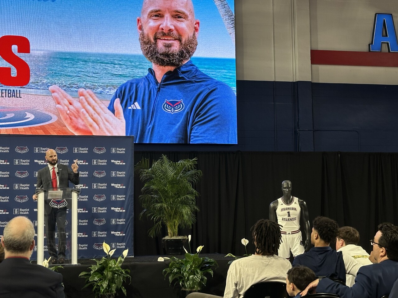 Head coach John Jakus addresses FAU Owls players during introductory news conference, March 29, 2024