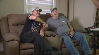 John Rich shakes Mr. Kirby's hand