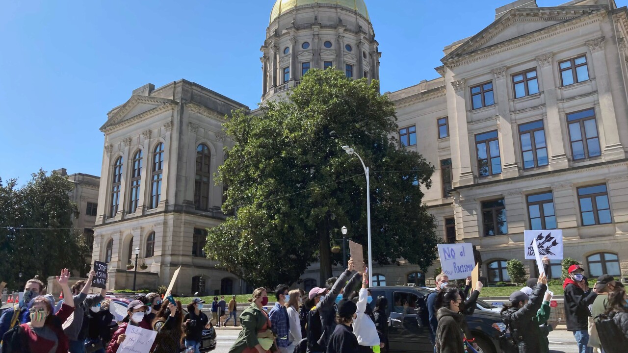 Hundreds in Atlanta rally against hate after spa shootings