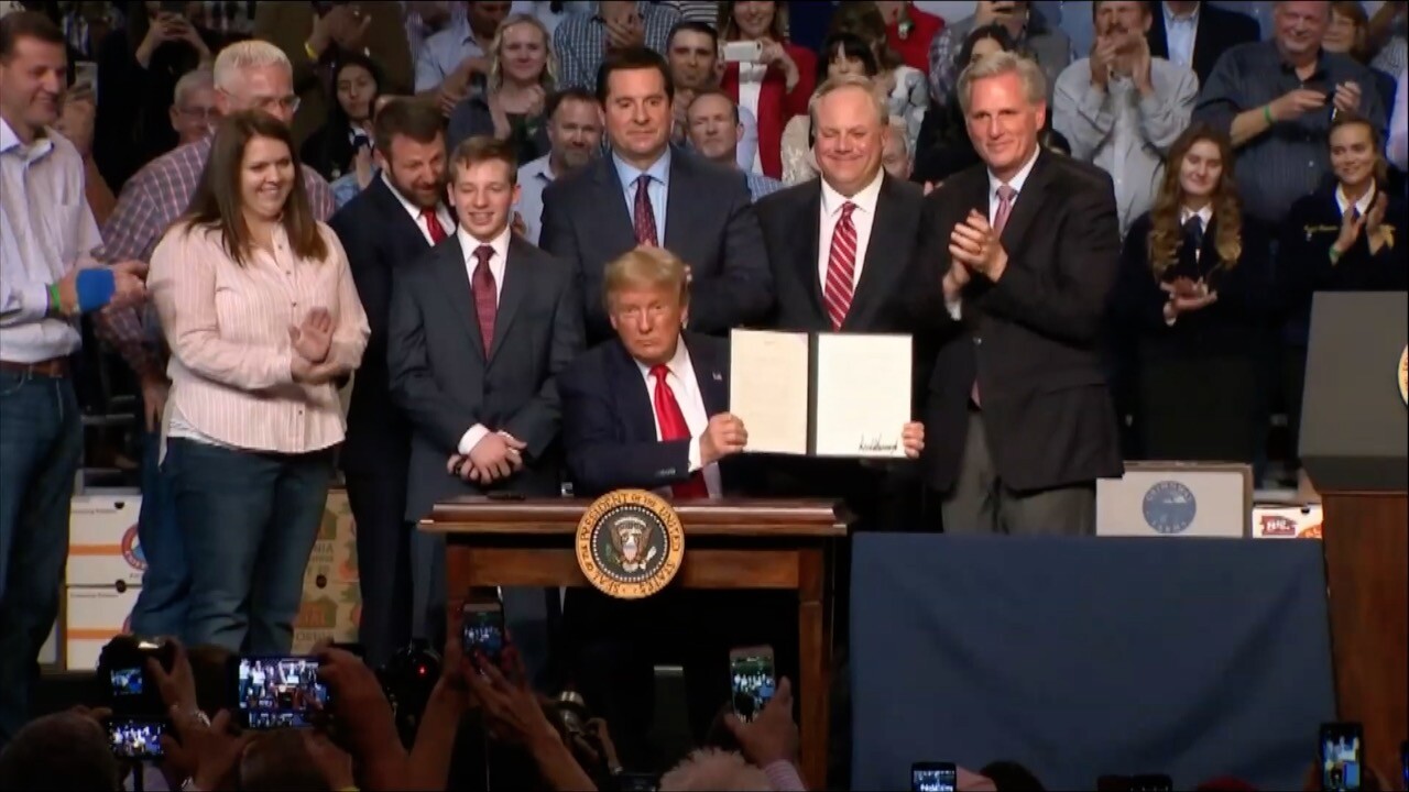Presidential signing of Presidential Memorandum