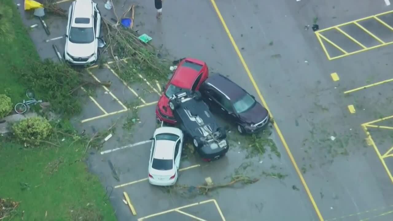 Vehicle overturned and toppled on top of other vehicles in Kings Point parking lot, Sept. 28, 2022