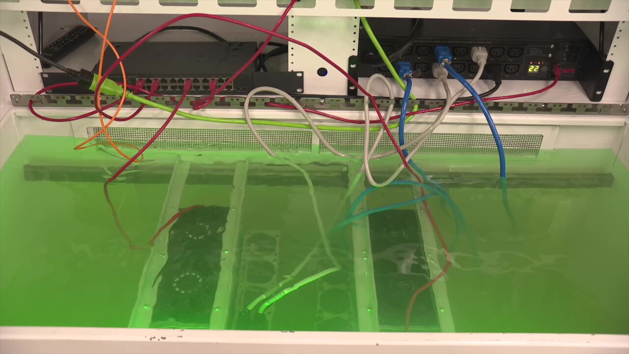 Servers are immersed in a special cooling fluid in a demonstration lab at Park Place Technologies, a Cleveland-area company that serves the data center industry.