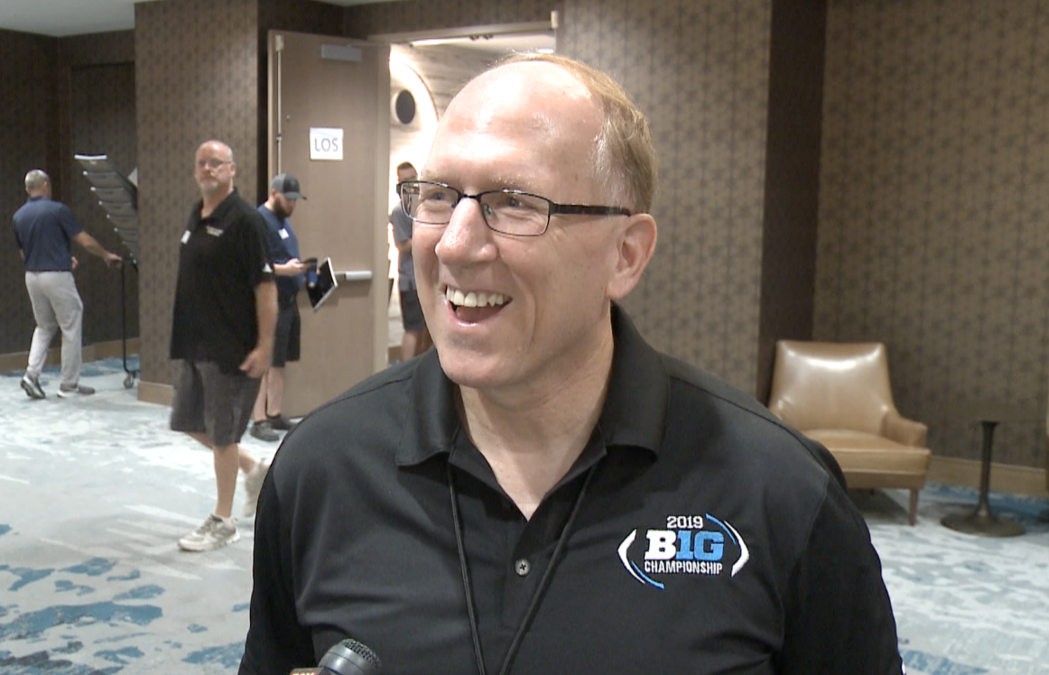 John Roggleman visits KOA football clinic