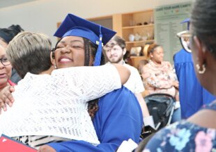 Stacia Mason celebrating at graduation.jpg
