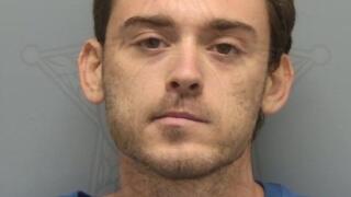 Lukas Carlton is booked in the Lee County Jail