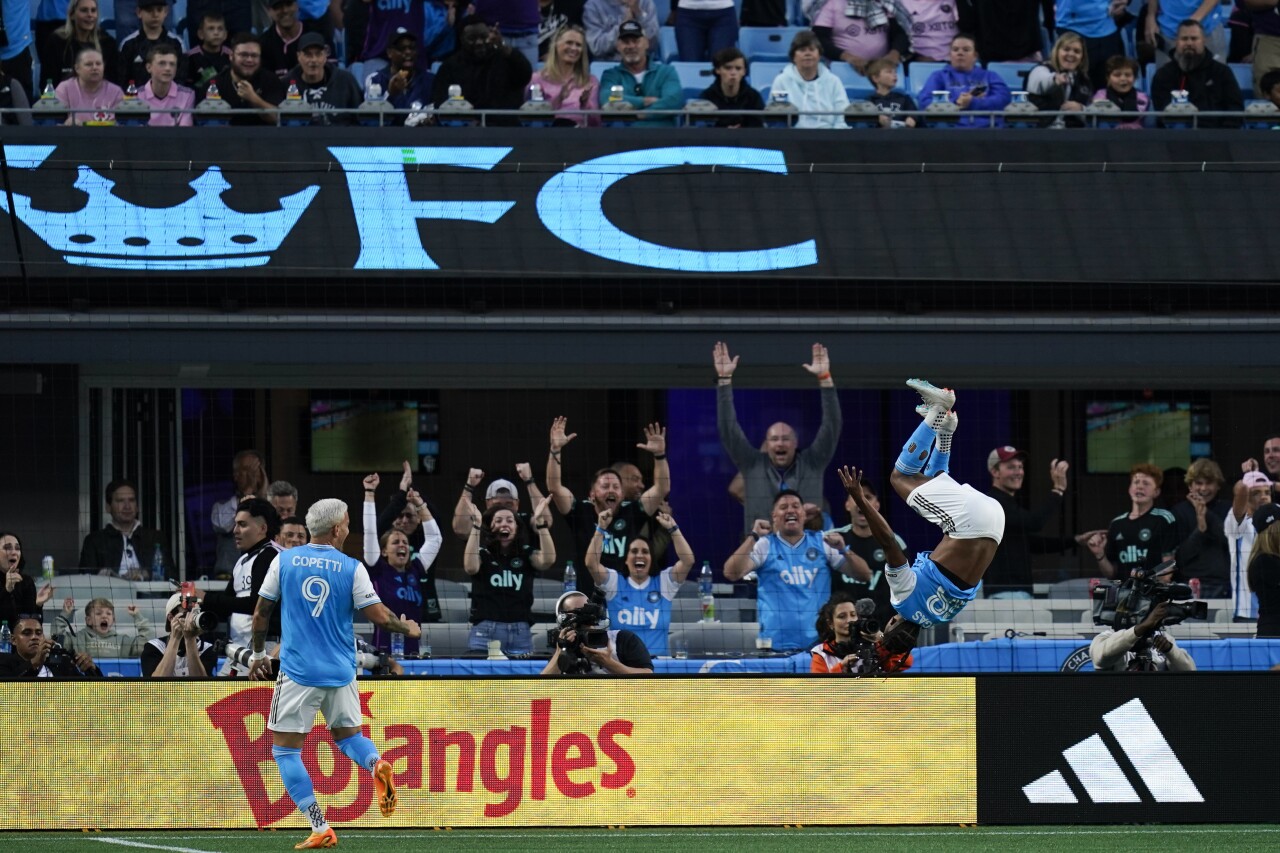 Charlotte FC forward Kerwin Vargas flips while celebrating with forward Enzo Copetti, Oct. 21, 2023