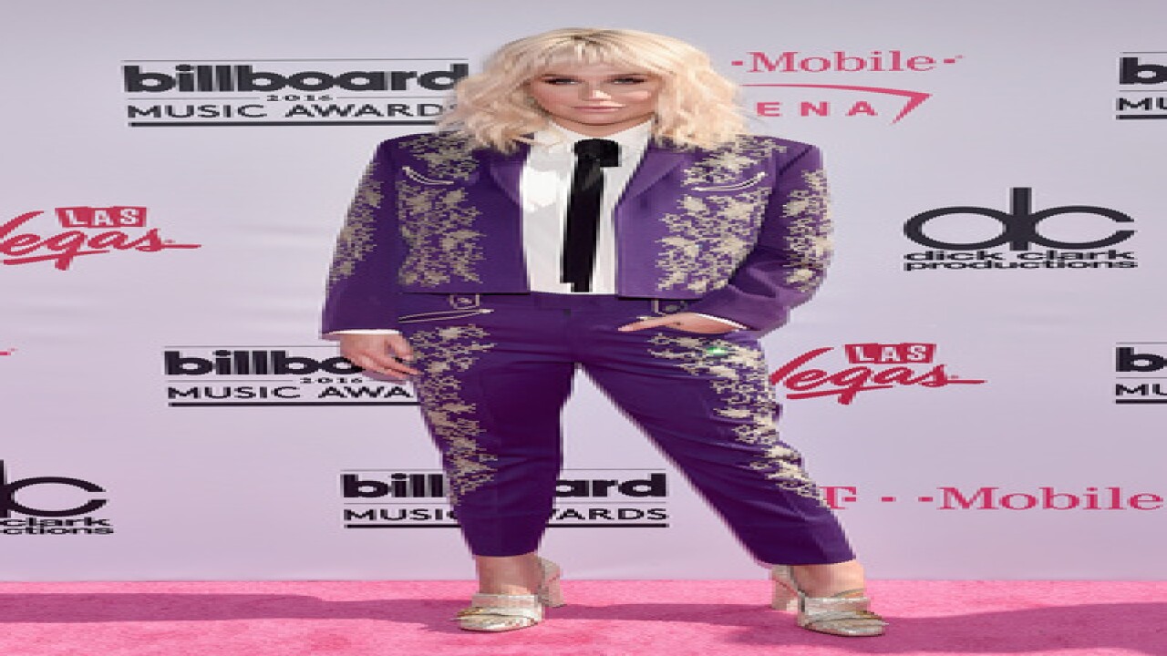 See best, worst looks from BBMA magenta carpet