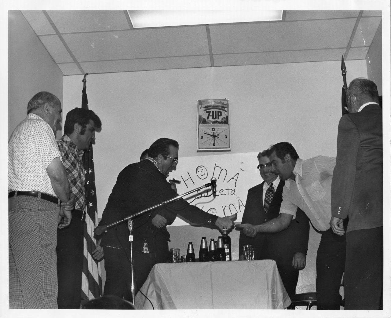 Group of Men at Potenza Lodge Playing Morra.png