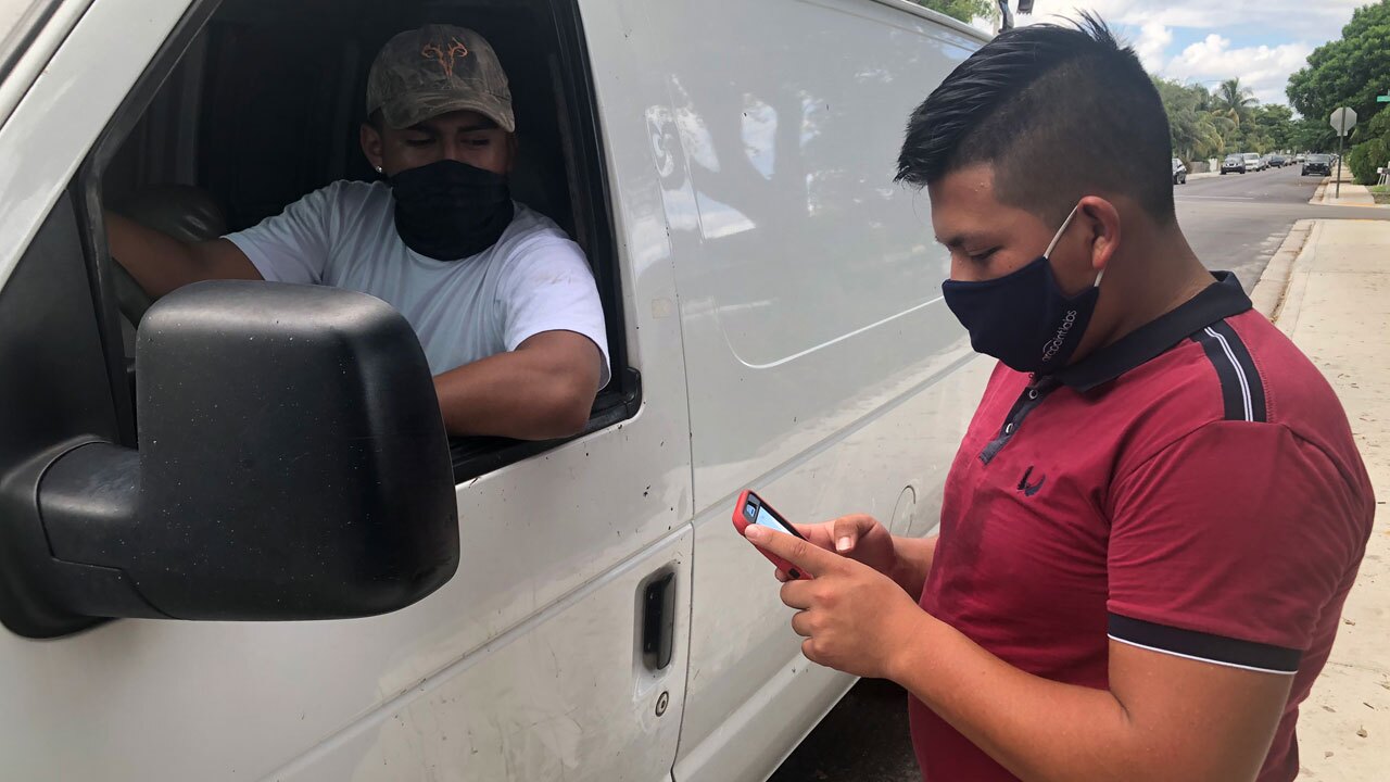 Census workers make a final push on the Oct. 15, 2020, deadline in Lake Worth Beach, Fla.