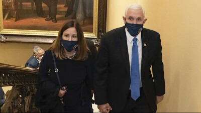 Vice President Mike Pence and his wife Karen walk at the Capitol