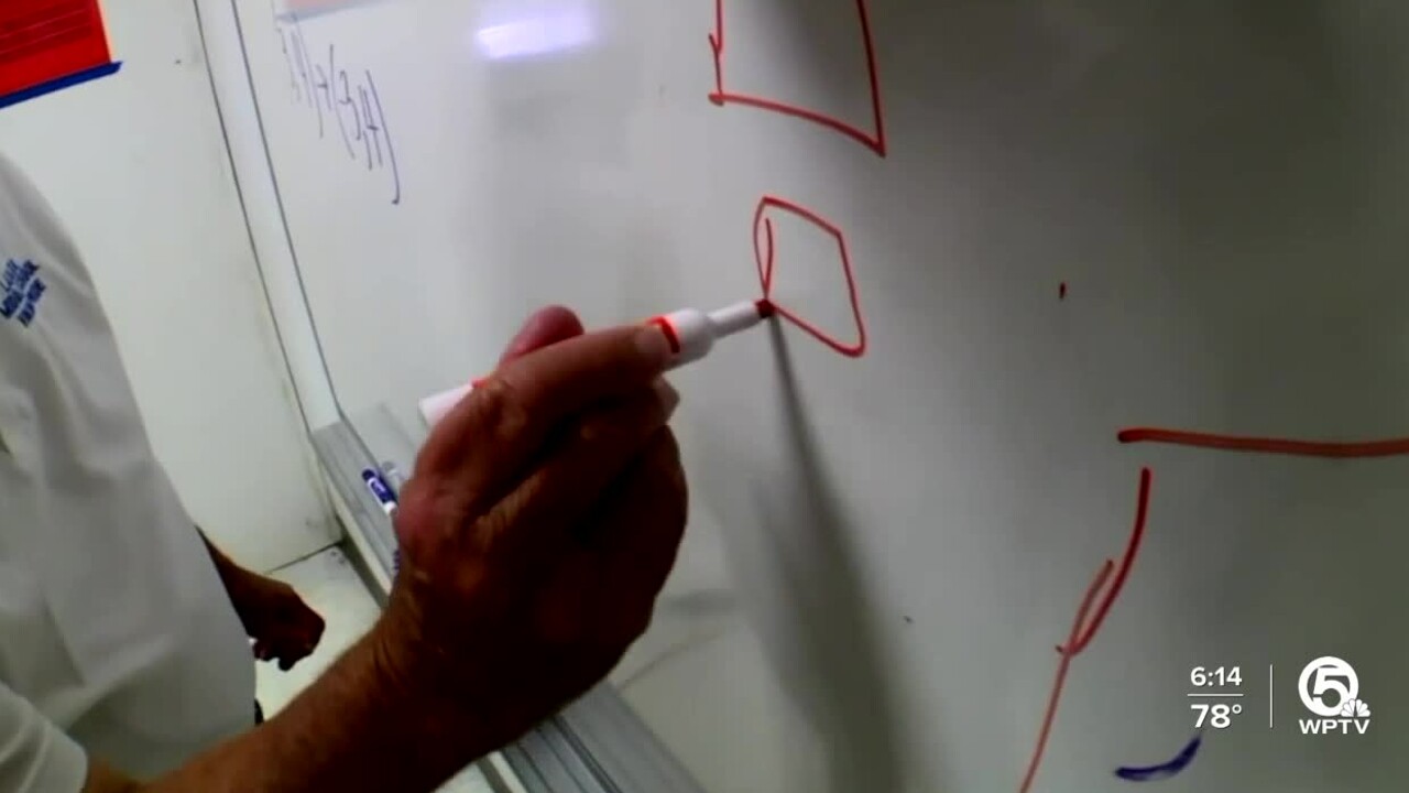 A Palm Beach County public school teacher instructs students during the 2021-22 academic year (1).jpg