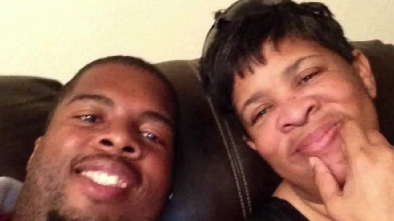 Carlos Edwards with his mother.