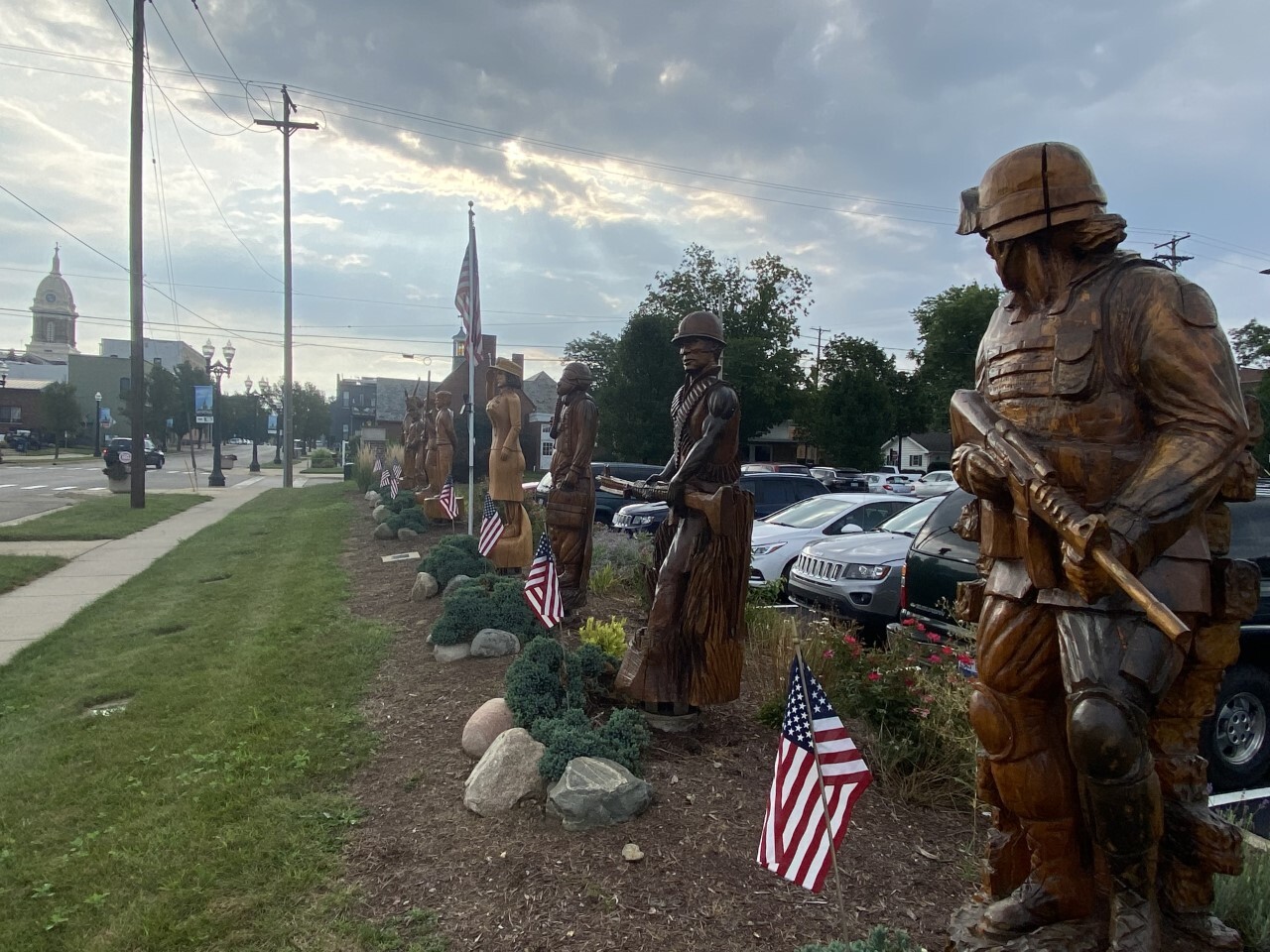 Eight soldiers representing eight U.S. wars outside of Mason City Hall