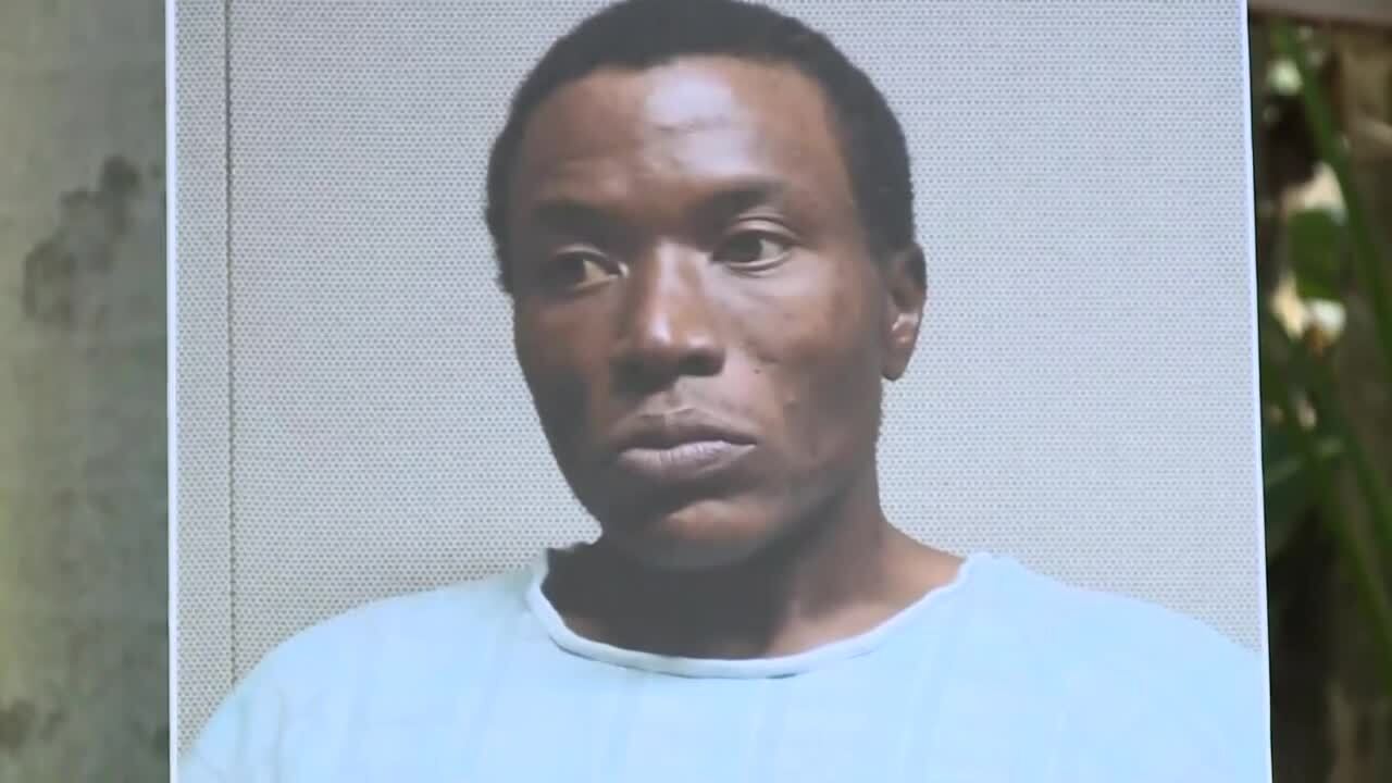 Poster board of Semmie Williams Jr., suspect in murder of Ryan Rogers