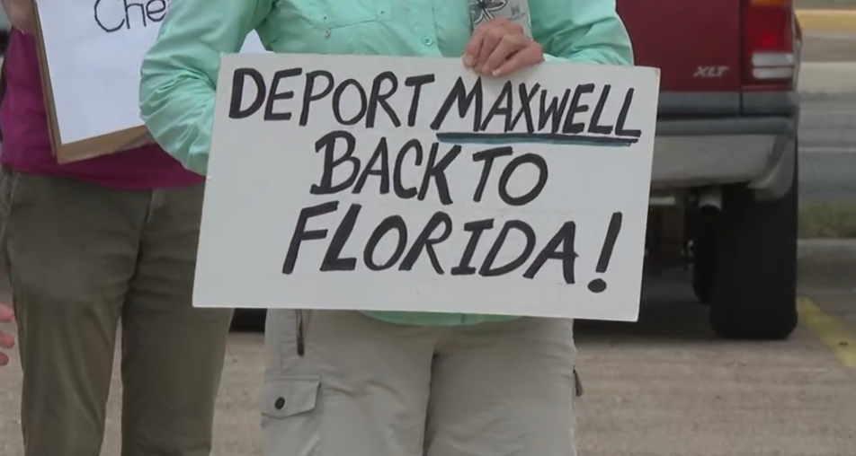 MAXWELL PROTEST SIGN.png