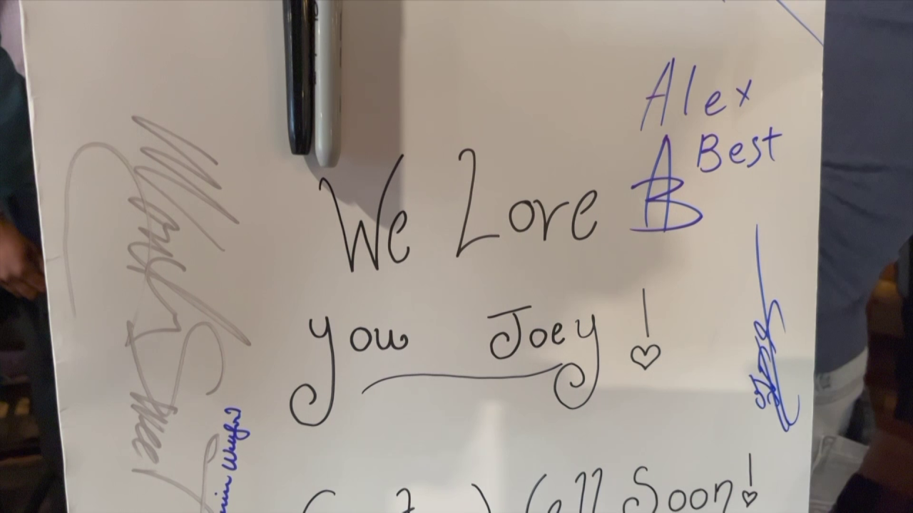 We Love You Joey sign