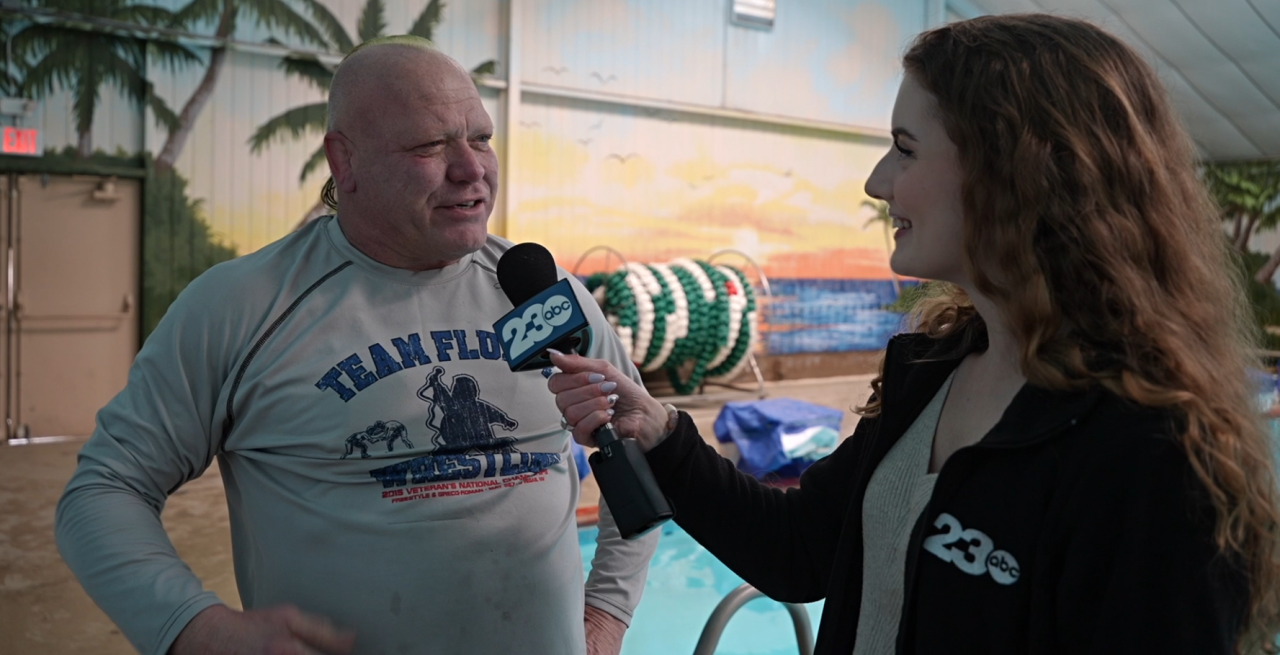 Neighborhood News Reporter Grace Laverriere interviewing Polar Plunge participant Curtis Nelson