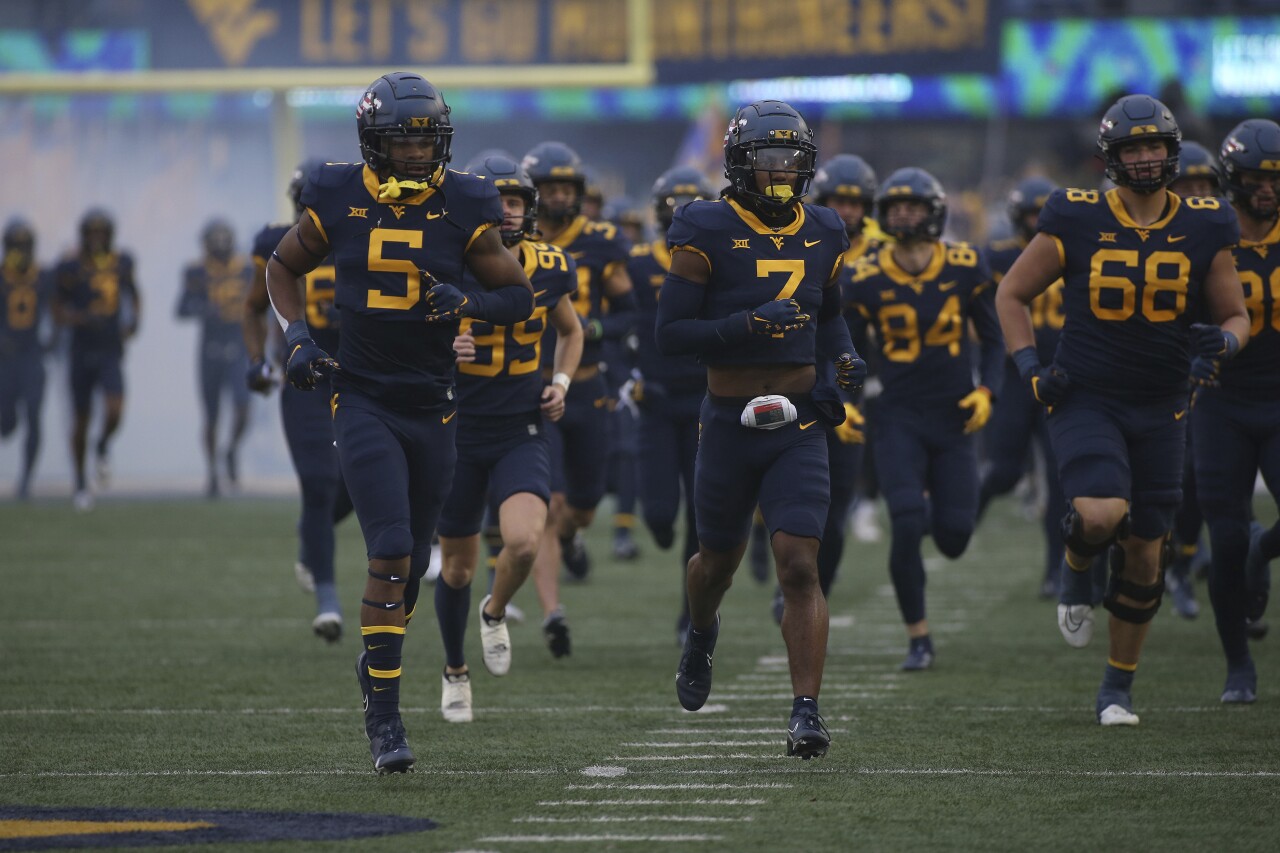 West Virginia Mountaineers run onto field before game, Nov. 12, 2022