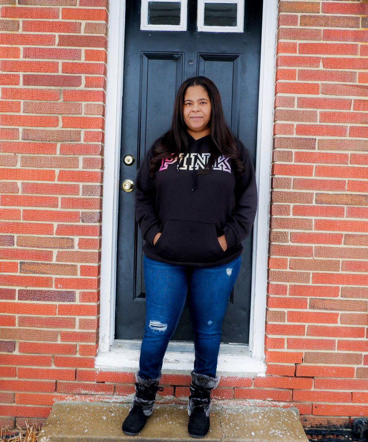 Shalandra Jeffries outside her home. (Noor Hindi_The Devil Strip).jpg