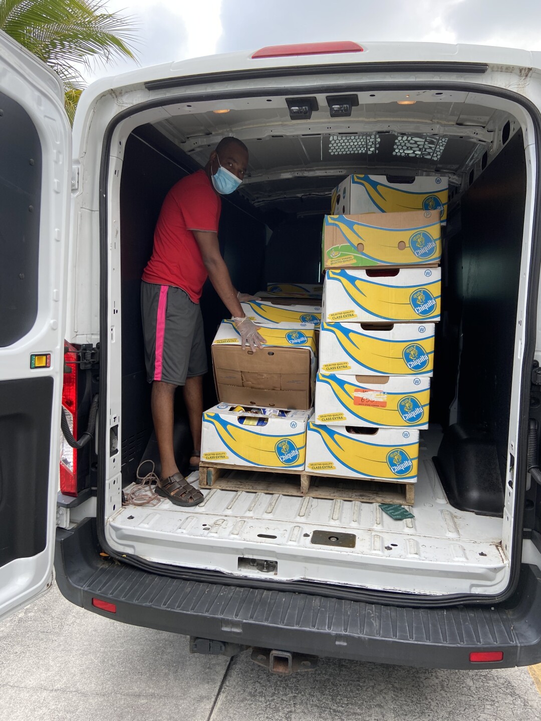 Haitians receive boxes of Chiquita bananas
