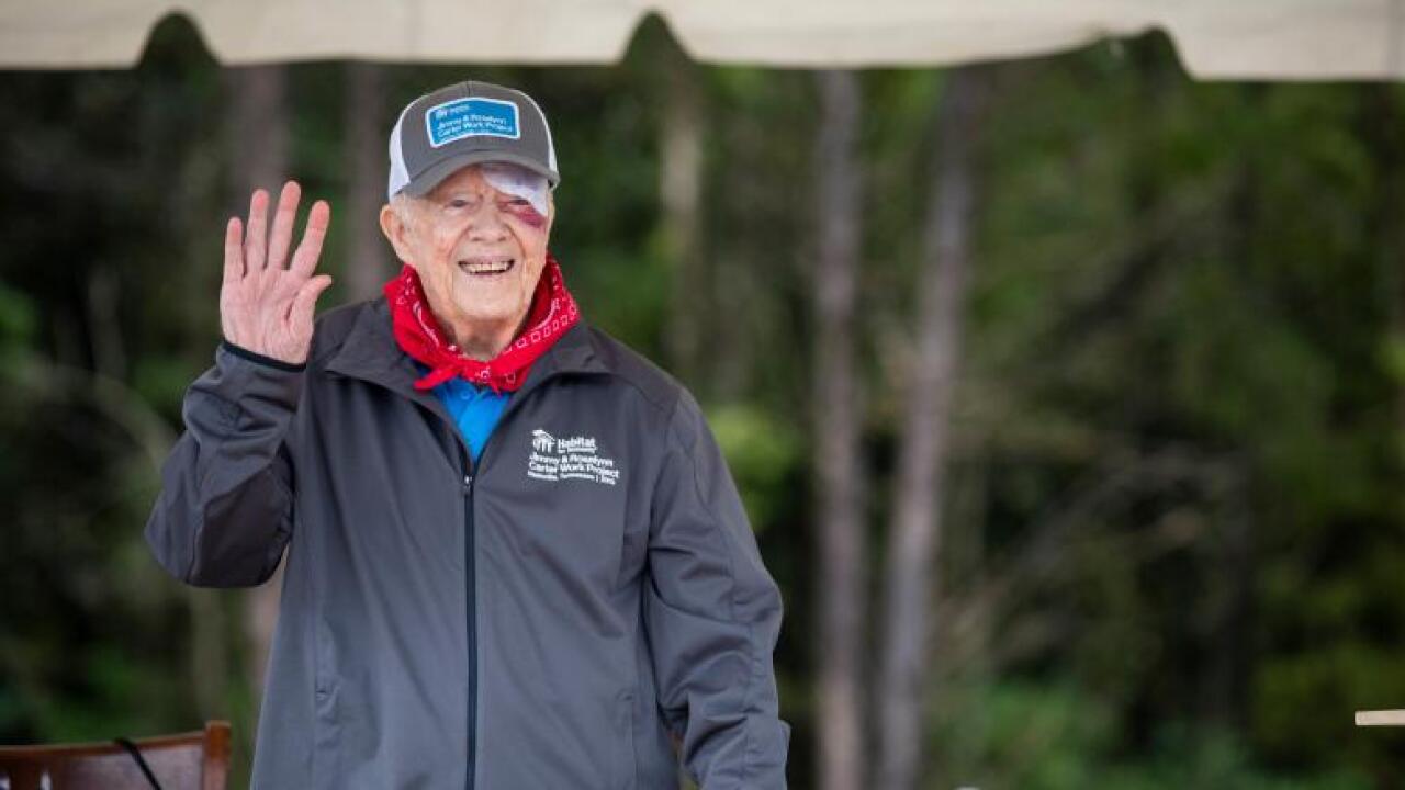 Jimmy Carter assists Habitat for Humanity one day after fall