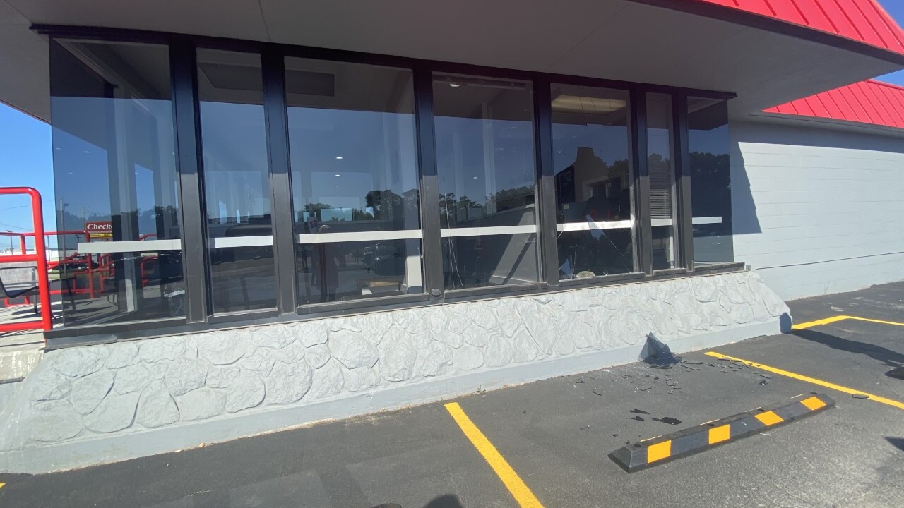 Windows smashed at AutoWest, 487 28t