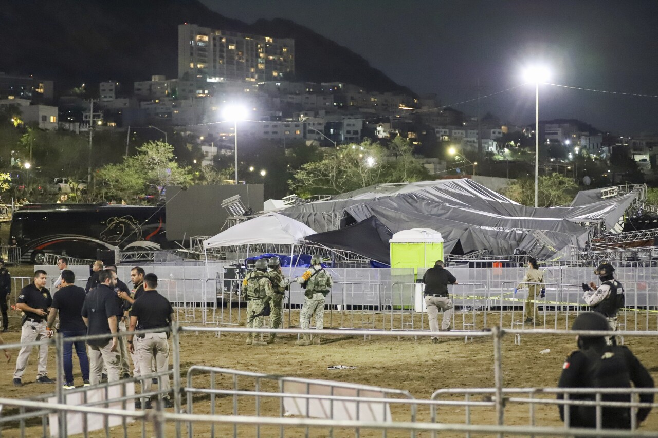 Security forces stand around a stage that collapsed due to a gust of wind during an event attended by presidential candidate Jorge Álvarez Máynez in Mexico.