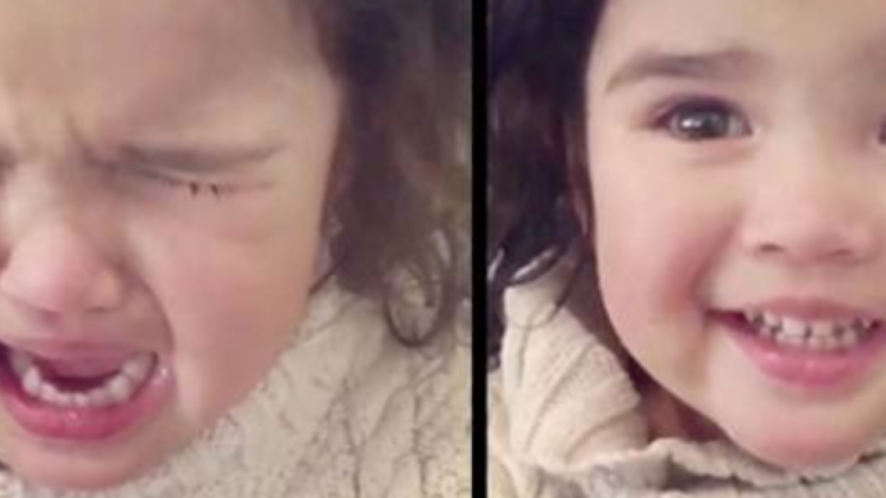 Little girl wipes away tears after mom mentions snacks