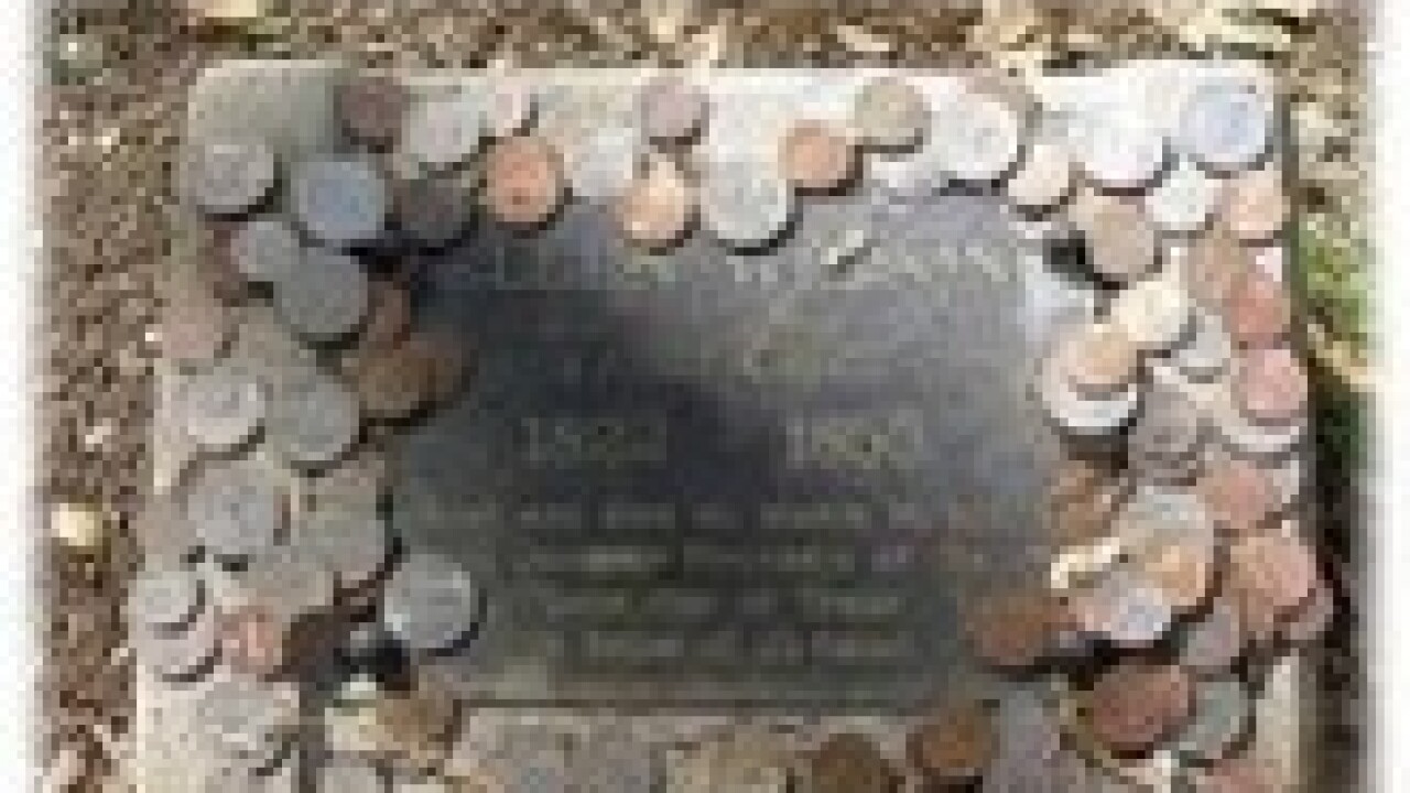 Coins left on tombstones have deeper meaning for some