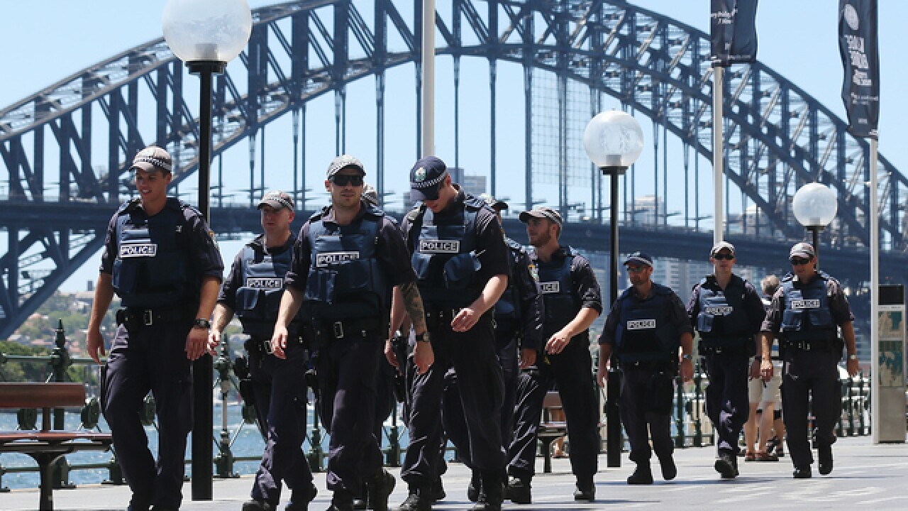 PICS: Standoff at Sydney cafe