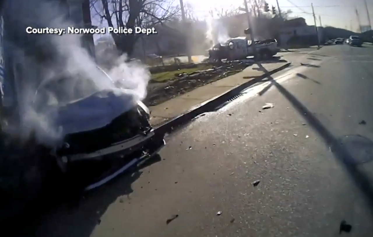 Screenshot from Norwood police body camera video shows a two-vehicle crash that ended a police pursuit