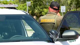A St. Lucie County deputy clocks drivers' speed on July 16, 2026.