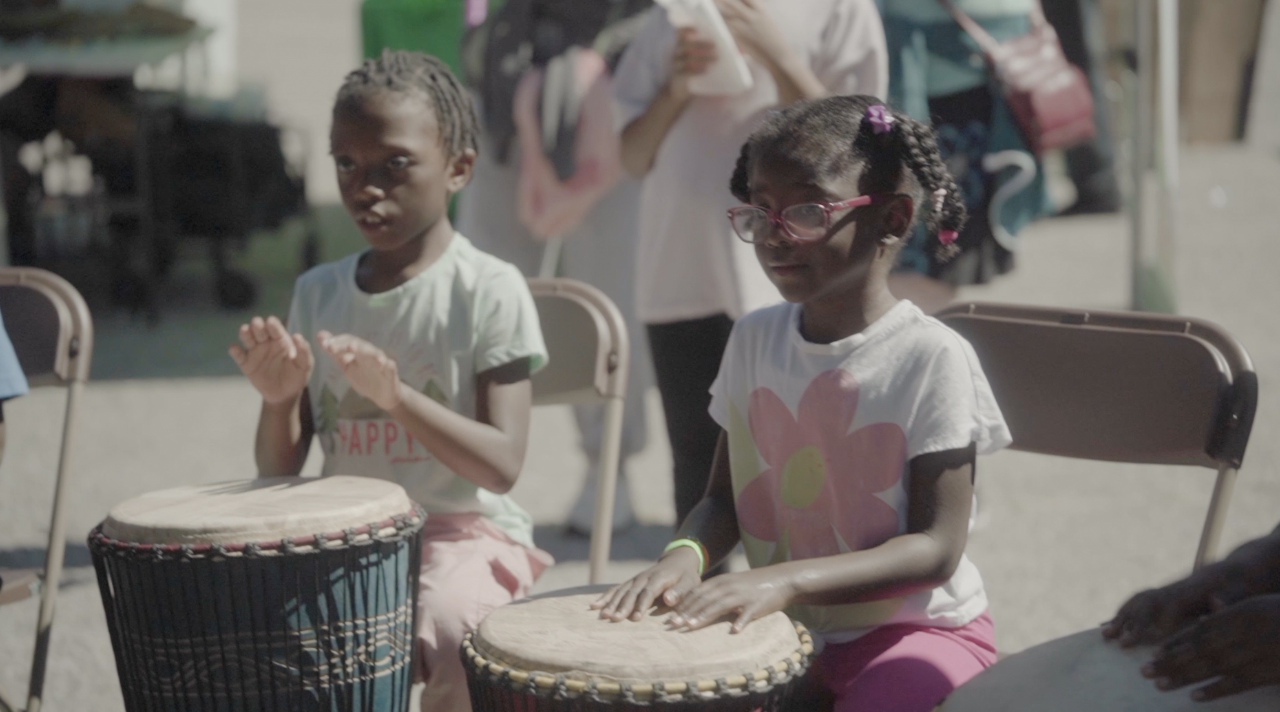 Children enjoying the drumming workshop at last year's festival
