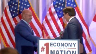 Blaise Igoglia and Gov. Ron DeSantis, July 16, 2025