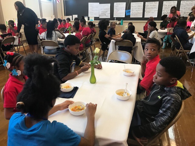 Students in manners and etiquette class
