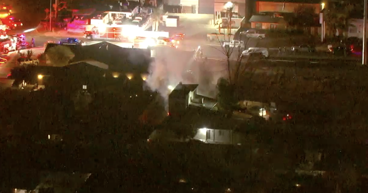 Man in custody after allegedly assaulting father, setting house on fire