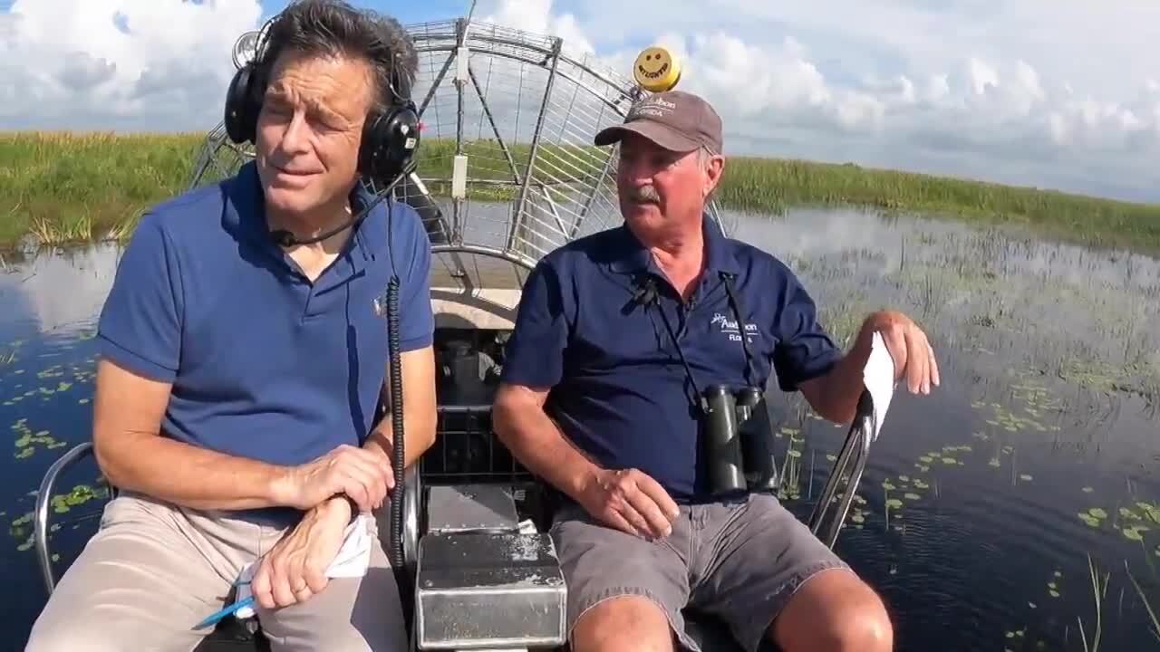 Michael Williams and Dr. Paul Gray on airboat in Lake Okeechobee