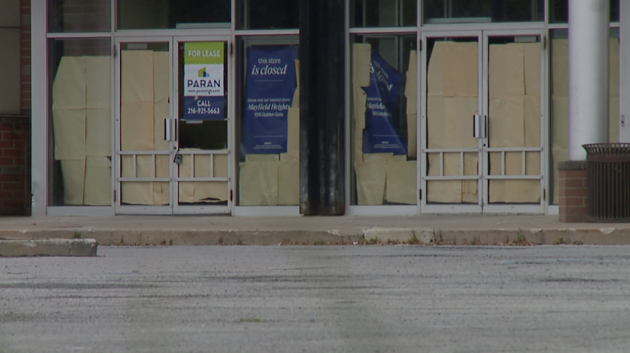 Empty store windows are papered over at Severance Town Center in Cleveland Heights.