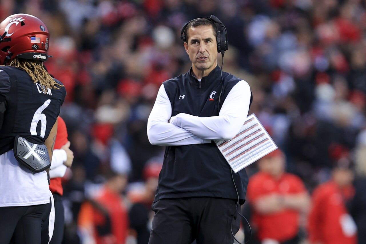 Cincinnati Bearcats head coach Luke Fickell on field in 2021
