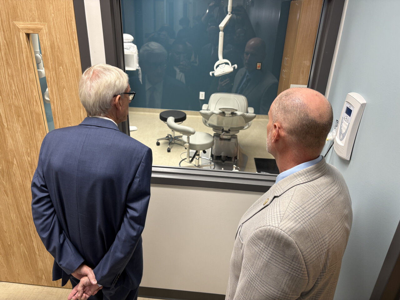 Governor Evers tours the facility that includes a dental unit