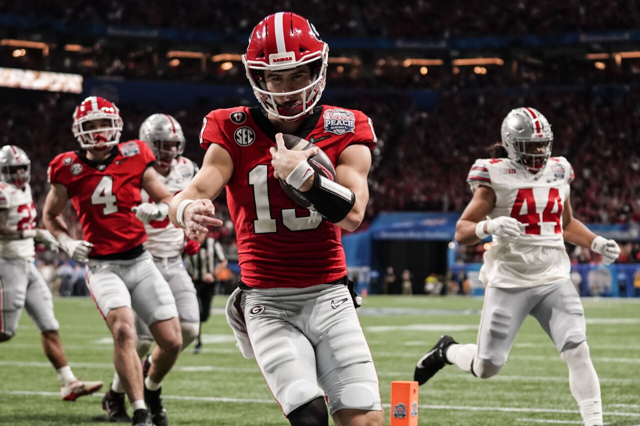 Georgia Bulldogs QB Stetson Bennett runs for TD vs. Ohio State Buckeyes in College Football Playoff semifinal at Peach Bowl, Dec. 31, 2022