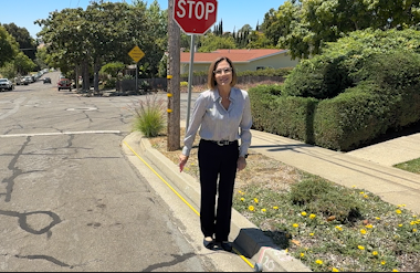 KSBY Reporter Jessica Roe used a tape measure and sidwalk chalk to demonstrate how far 20 feet is from an intersection with the mark in front of her shoes.png