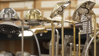 Several Cedric Hartman luminaires, inside his Omaha workshop studio.